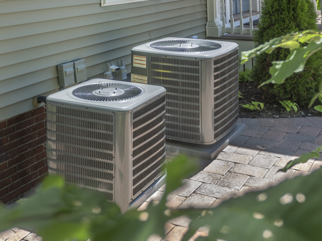 HVAC heating and air conditioning units installed outside